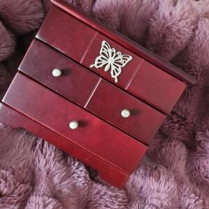 Elegant Red Jewelry Box with Butterfly Accent